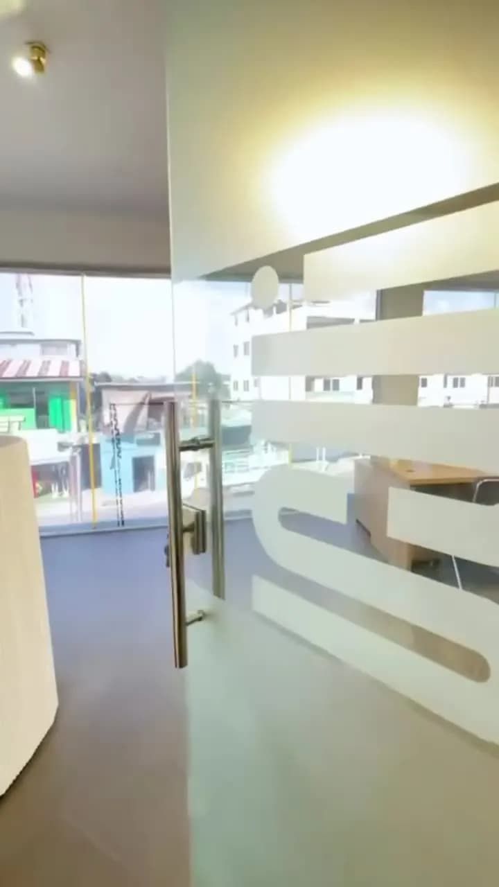 Glass entrance with brand graphics