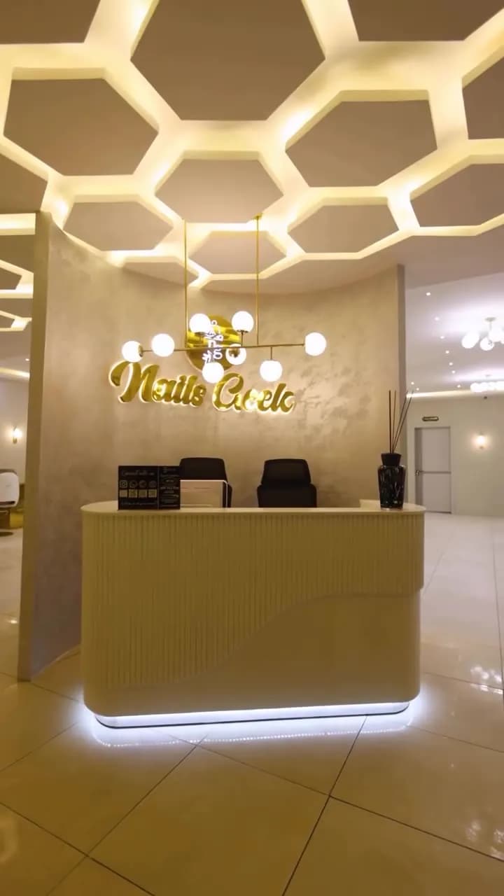 Nails Geek reception with backlit honeycomb ceiling